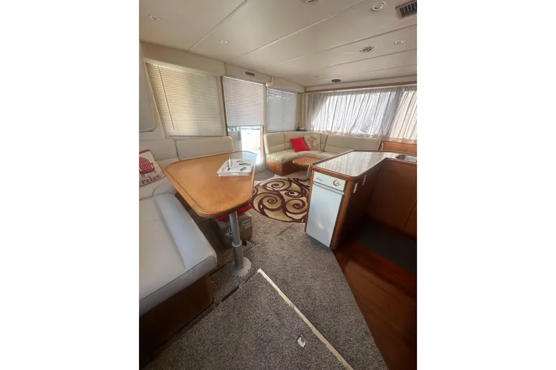 Slide: The Image of Interior of 2002 Wright Catamaran C50 Pilot House, featuring cozy seating and modern amenities. - 20