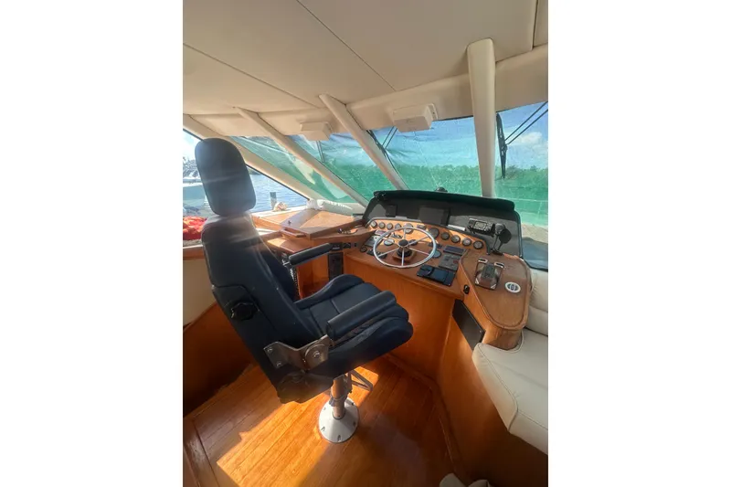 Slide: The Image of Pilot house interior of 2002 Wright Catamaran C50, featuring helm and captain's chair. - 26