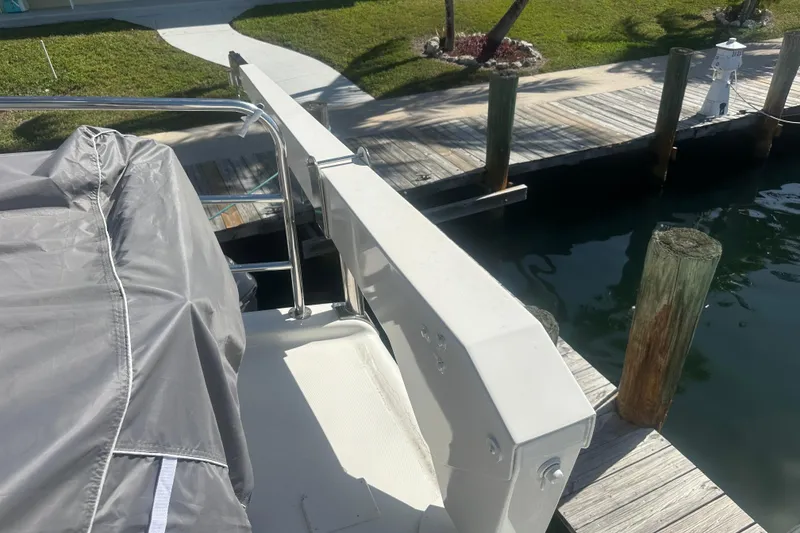 Slide: The Image of 2002 Wright Catamaran C50 Pilot House Power Catamaran docked at marina. - 32