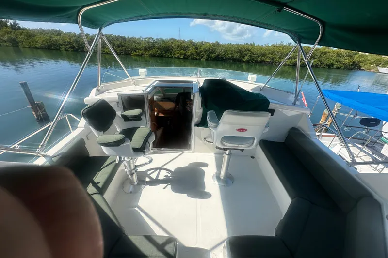 Slide: The Image of 2002 Wright Catamaran C50 Pilot House Power Catamaran with spacious deck and seating area. - 34