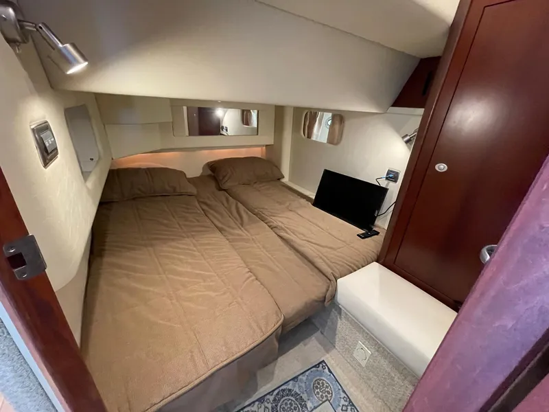 Slide: The Image of VIP STATEROOM OVERVIEW W/CEDAR LINED CLOSET & PRIVATE ENTRANCE TO HEAD - 29
