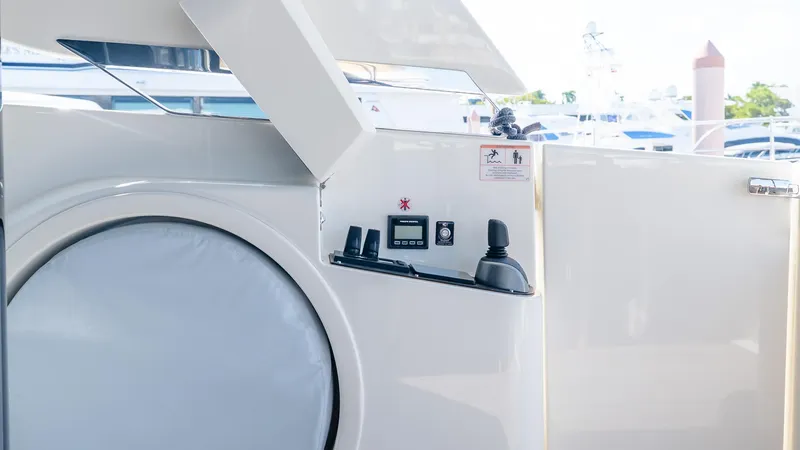 Slide: The Image of Control panel on 2024 Absolute 68 NAVETTA yacht, featuring modern navigation equipment. - 11