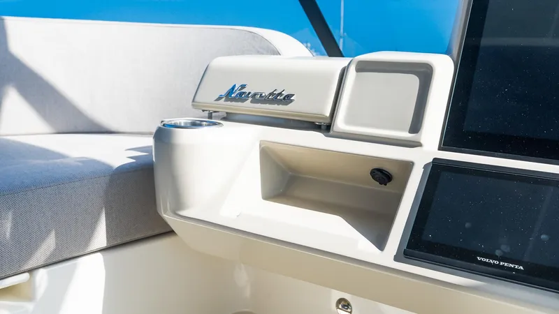 Slide: The Image of 2024 Absolute 68 NAVETTA yacht interior with sleek design and modern controls. - 29