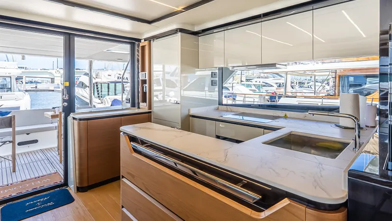 Slide: The Image of Interior of Absolute Navetta 68 yacht, 2024 model, featuring modern kitchen. - 40