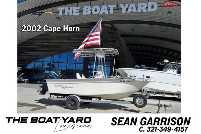 The Image of 2002 Cape Horn 17 boat with American flag at The Boat Yard, Louisiana. - 0