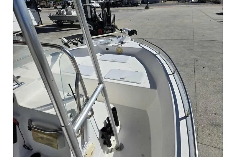 Slide: The Image of 2002 Cape Horn 17 boat interior with stainless steel railings and storage compartments. - 6