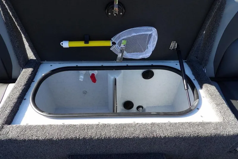 Slide: The Image of 2026 Lund 1875 Renegade livewell with net and storage compartment. - 15