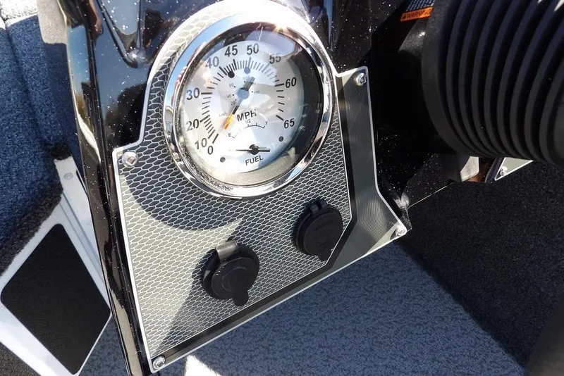 Slide: The Image of Dashboard of 2026 Lund 1875 Renegade boat with speedometer and controls. - 21