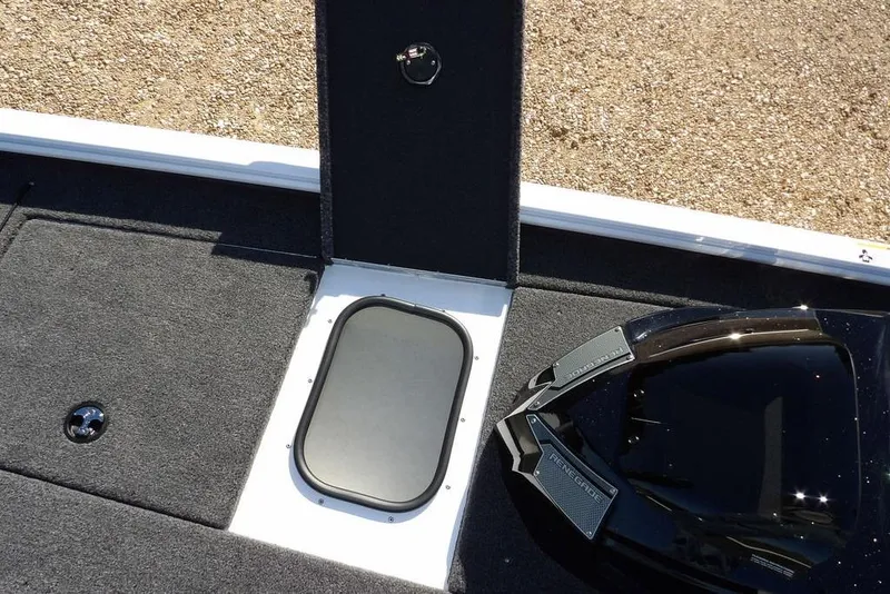 Slide: The Image of 2026 Lund 1875 Renegade boat deck with storage compartments and sleek design. - 30