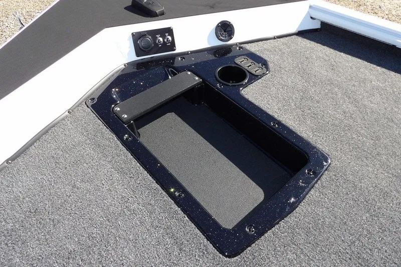 Slide: The Image of 2026 Lund 1875 Renegade boat deck with storage compartment and control panel. - 40