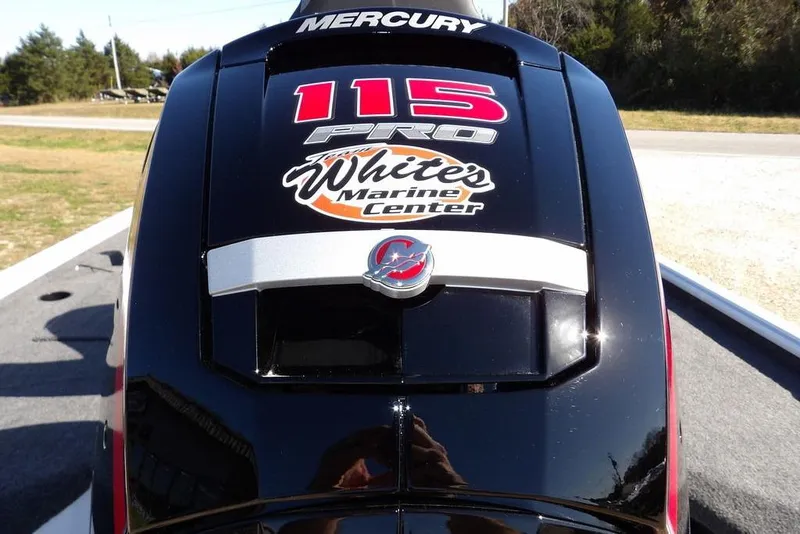 Slide: The Image of 2026 Lund 1875 Renegade with Mercury 115 Pro outboard engine, featuring White's Marine Center logo. - 49