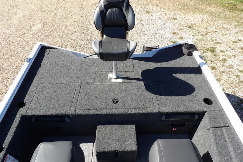 Slide: The Image of 2026 Lund 1875 Renegade boat interior with seating and storage compartments. - 6