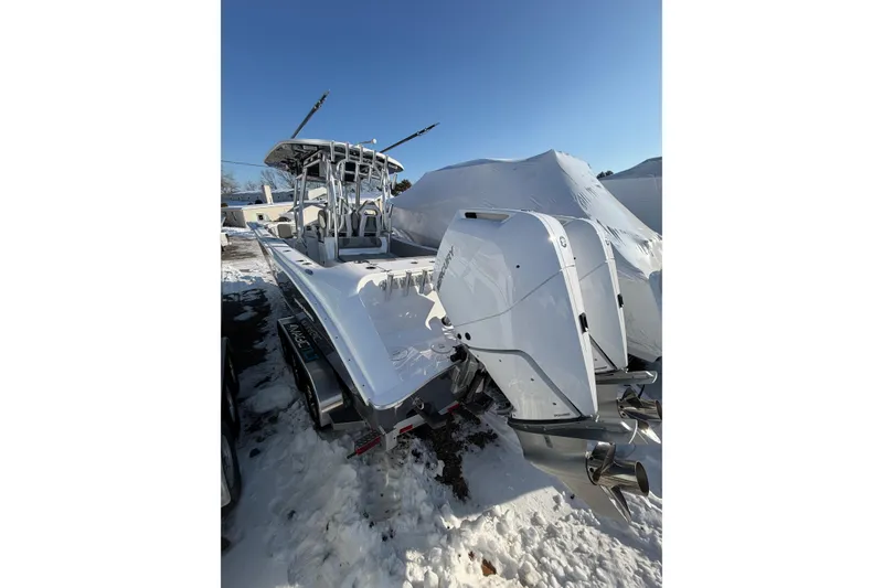 Slide: The Image of 2026 Cape Horn 32 XS boat in snow, side view. - 1
