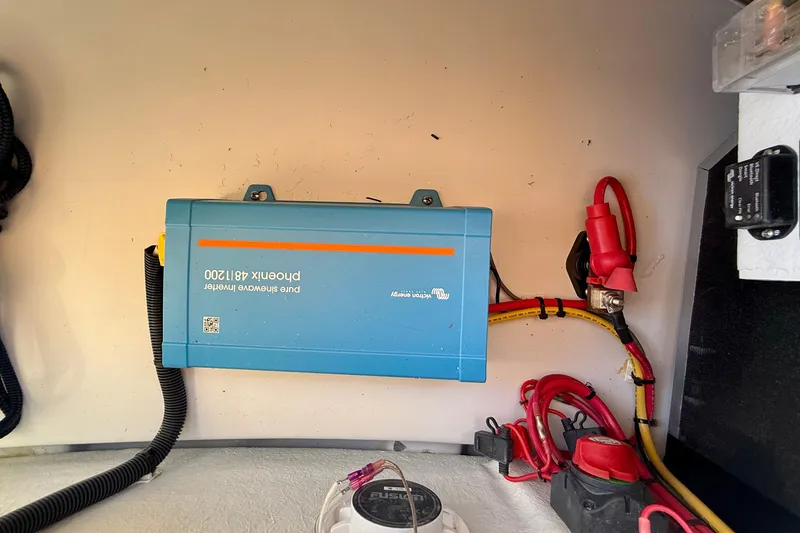 Slide: The Image of Electrical setup in a 2022 Duffy Suncruiser 22 with a Victron Energy inverter. - 19