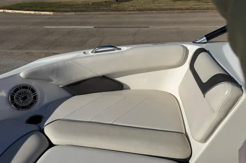 Slide: The Image of 2013 Yamaha Boats AR192 interior seating with speaker and cup holder. - 16