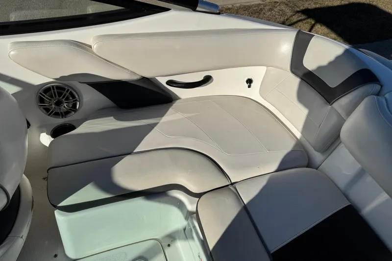 Slide: The Image of 2013 Yamaha Boats AR192 interior seating with speaker and cup holder. - 7