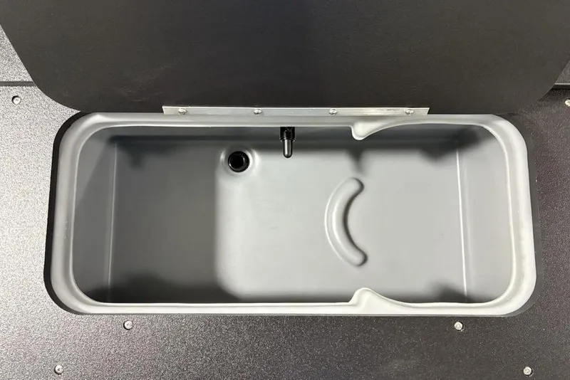 Slide: The Image of Livewell compartment in 2026 Sun Tracker SportFish 22 DLX boat, featuring a sleek design. - 36