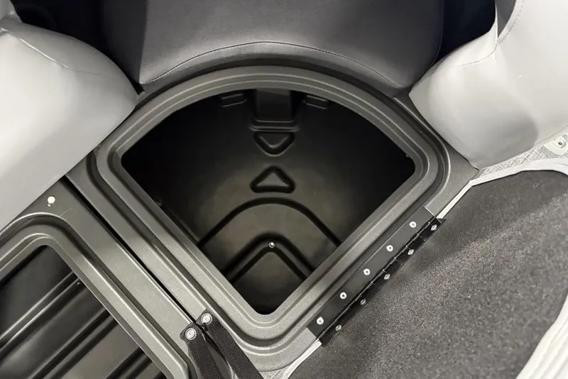 Slide: The Image of Storage compartment of 2026 Sun Tracker SportFish 22 DLX boat, featuring durable interior design. - 7