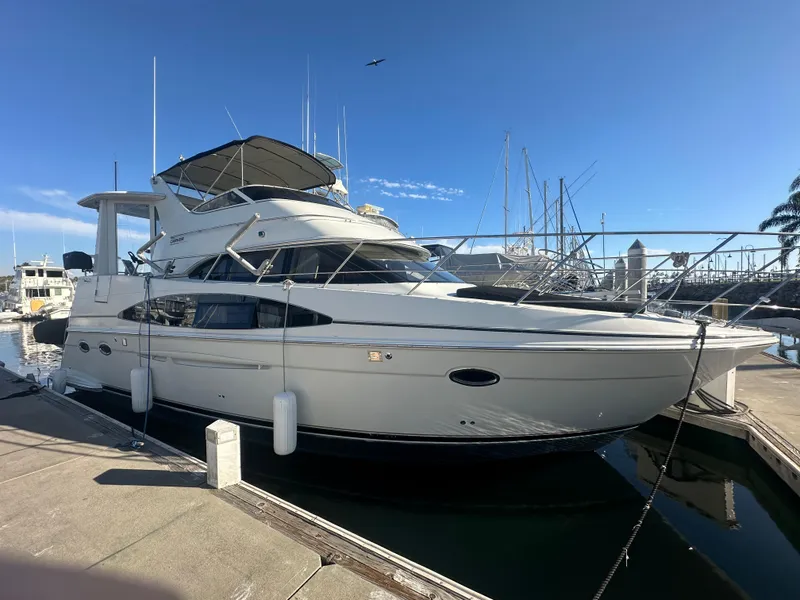 The Image of 2004 Carver 396 Motor Yacht docked on a sunny day. - 0