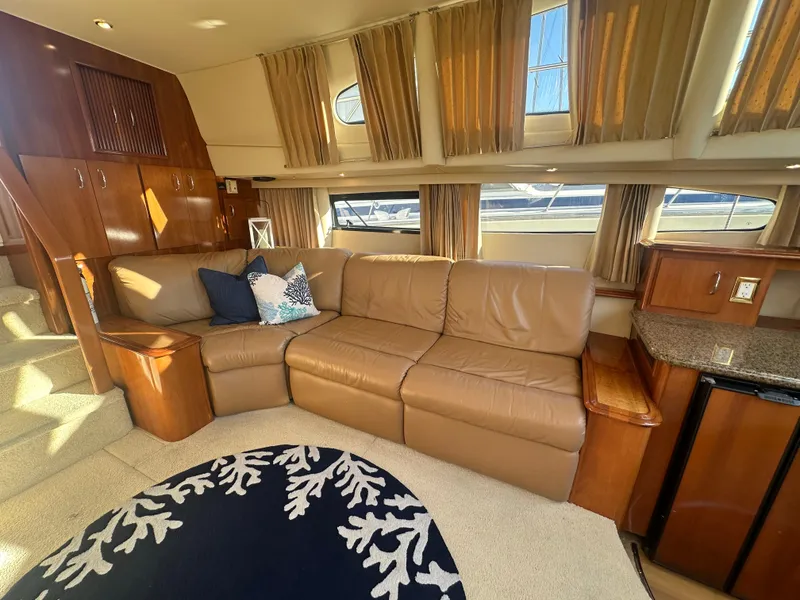 Slide: The Image of Interior of 2004 Carver 396 Motor Yacht with leather sofa and carpet. - 12