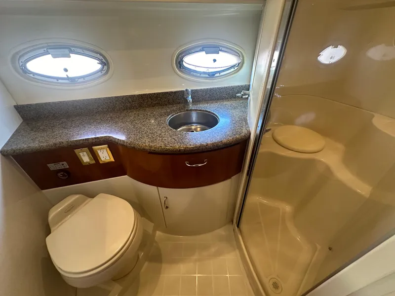 Slide: The Image of 2004 Carver 396 Motor Yacht bathroom with shower and sink. - 23