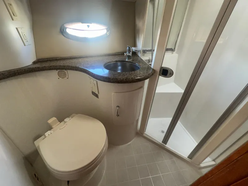 Slide: The Image of 2004 Carver 396 Motor Yacht docked, side view. - 27