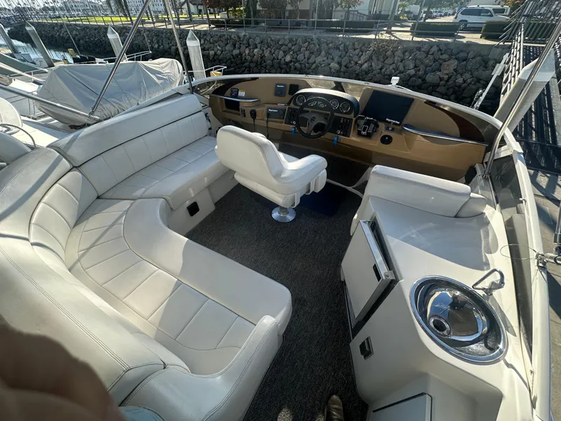 Slide: The Image of Dashboard of a 2004 Carver 396 Motor Yacht with gauges and steering wheel. - 32