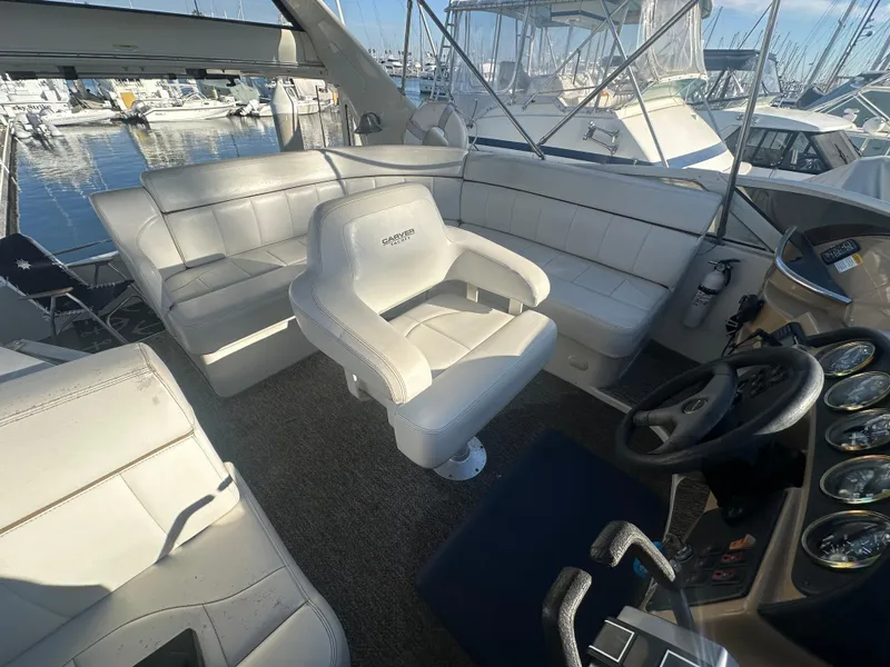 Slide: The Image of Close-up of a 2004 Carver 396 Motor Yacht RPM gauge displaying 417.5. - 33