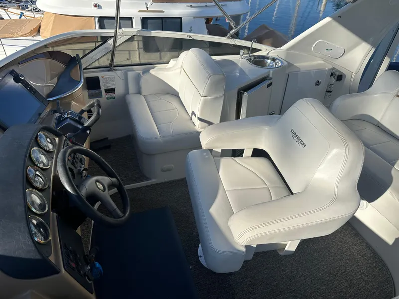 Slide: The Image of Close-up of a 2004 Carver 396 Motor Yacht RPM gauge displaying 4511 hours. - 34