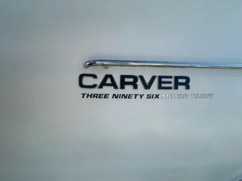 Slide: The Image of Carver 396 Motor Yacht 2004 emblem on white background. - 4