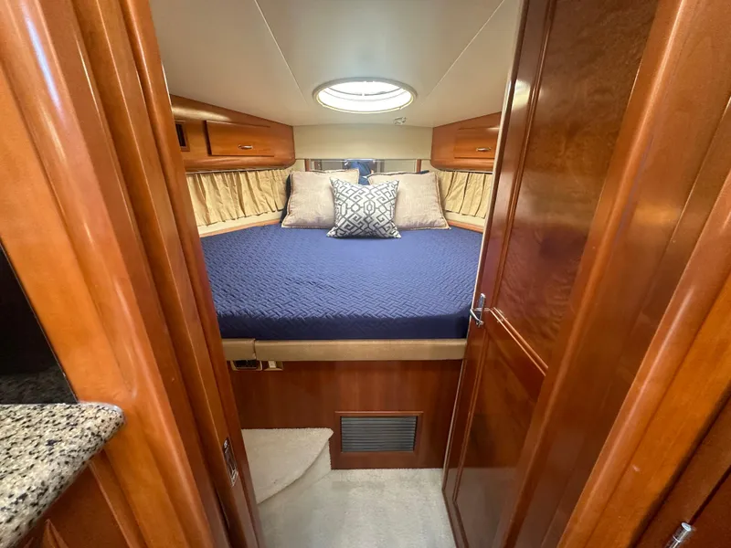 Slide: The Image of 2004 Carver 396 Motor Yacht with deck sun loungers. - 26