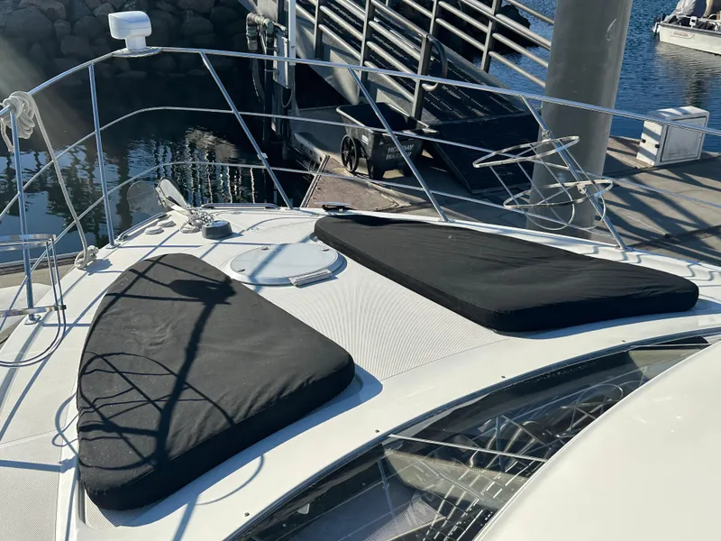 Slide: The Image of Interior of a 2004 Carver 396 Motor Yacht with white leather seats. - 30