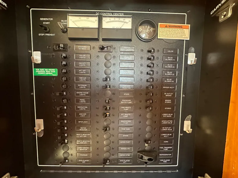 Slide: The Image of 2004 Carver 396 Motor Yacht docked at marina under clear blue sky. - 43