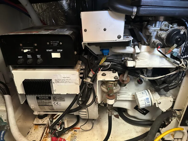 Slide: The Image of 2004 Carver 396 Motor Yacht docked at marina under clear sky. - 44