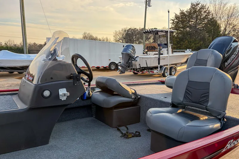 Slide: The Image of 2020 Tracker Bass Tracker Classic XL boat interior with steering console and seating. - 4