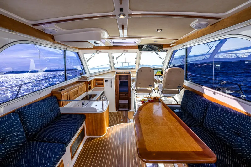 Slide: The Image of Luxurious 2013 Back Cove 37 yacht interior with elegant seating and ocean view. - 25