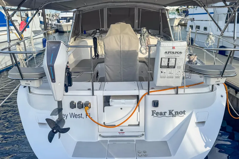 Slide: The Image of Cockpit of 2022 Catalina 385 sailboat with navigation equipment and steering wheel. - 16