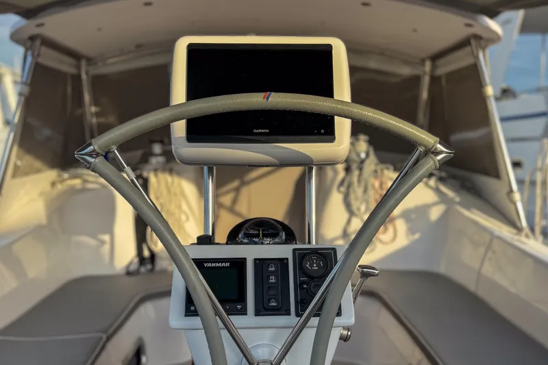 Slide: The Image of Luxurious interior of 2022 Catalina 385 yacht with cozy seating and nautical decor. - 25