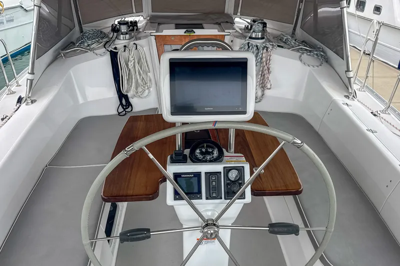 Slide: The Image of Interior of 2022 Catalina 385 yacht with cozy seating and modern kitchen area. - 26