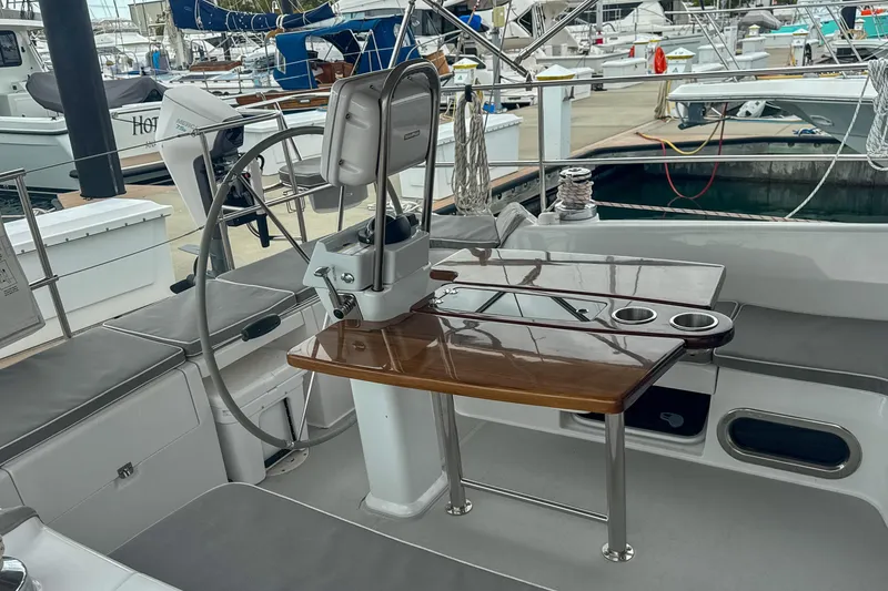 Slide: The Image of Interior of 2022 Catalina 385 sailboat with cozy seating and nautical decor. - 27