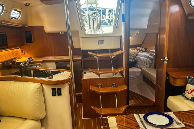 Slide: The Image of Close-up of Catalina 385 sailboat rigging and pulleys, 2022 model. - 40