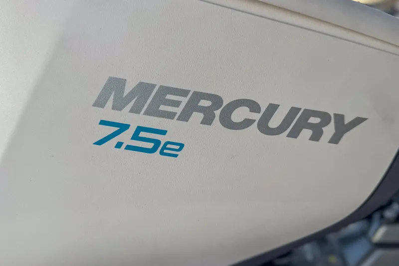 Slide: The Image of Wooden helm station on a 2022 Catalina 385 sailboat with cup holders. - 52