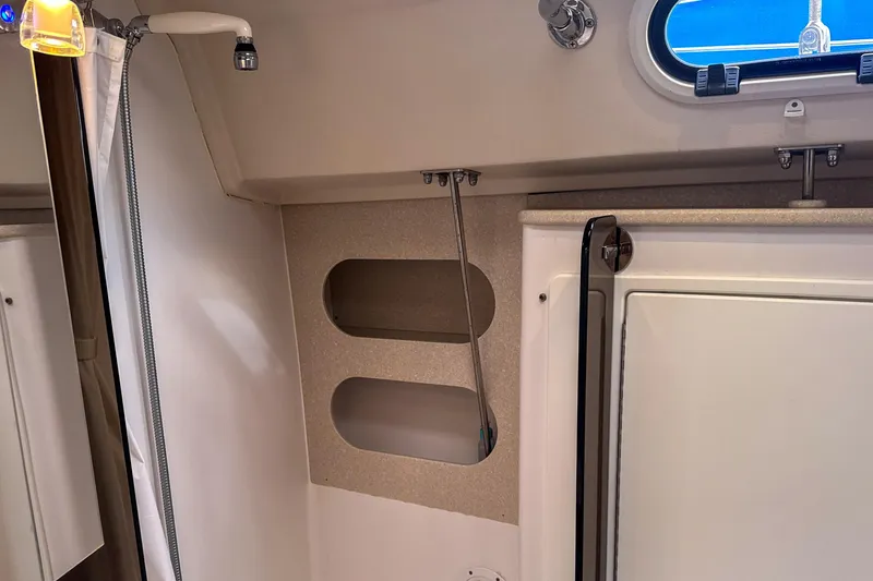 Slide: The Image of Blue Victron Energy charger in Catalina 385, 2022 model, with connected battery system. - 55