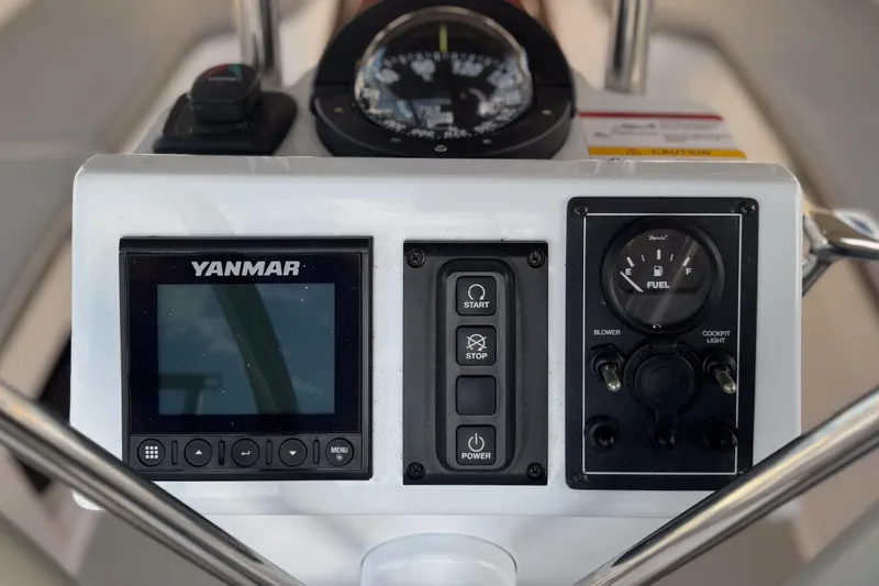 Slide: The Image of Bow of a 2022 Catalina 385 sailboat docked in a marina. - 68