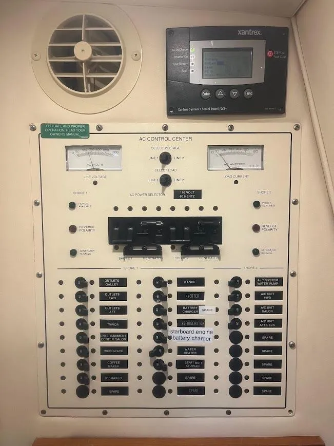 Slide: The Image of Electrical control panel on a 2000 Carver 440 Hardtop Express boat. - 29