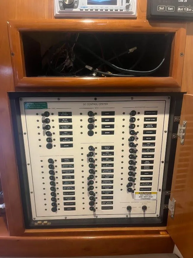 Slide: The Image of Electrical control panel on a 2000 Carver 440 Hardtop Express boat. - 30