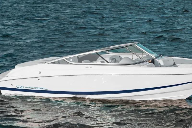 The Image of 2026 Regal 2000 ES boat on Karavan trailer in indoor storage facility. - 0