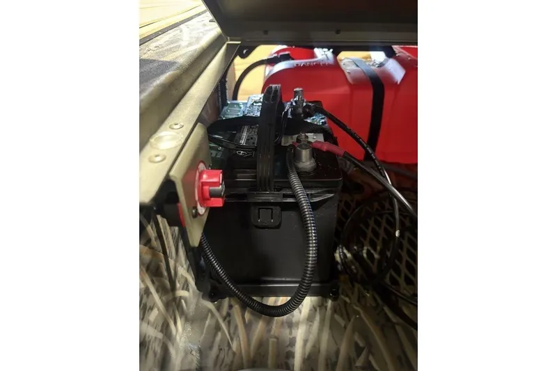 Slide: The Image of Battery compartment of 2026 Tracker Grizzly 1650 T Prairie Wings Edition boat. - 16