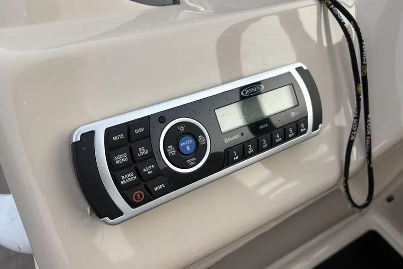 Slide: The Image of Control panel of a 2019 Sun Tracker Fishin' Barge 20 DLX with Jensen audio system. - 17