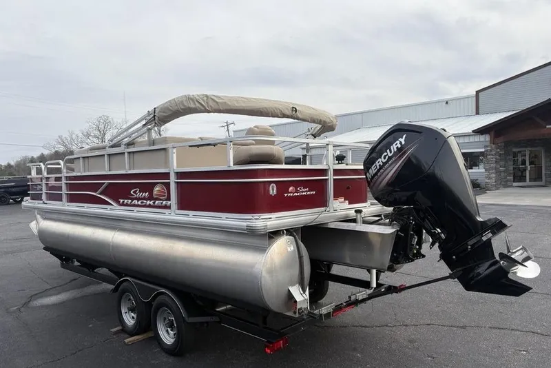 Slide: The Image of 2019 Sun Tracker Fishin' Barge 20 DLX pontoon boat with Mercury outboard motor. - 4